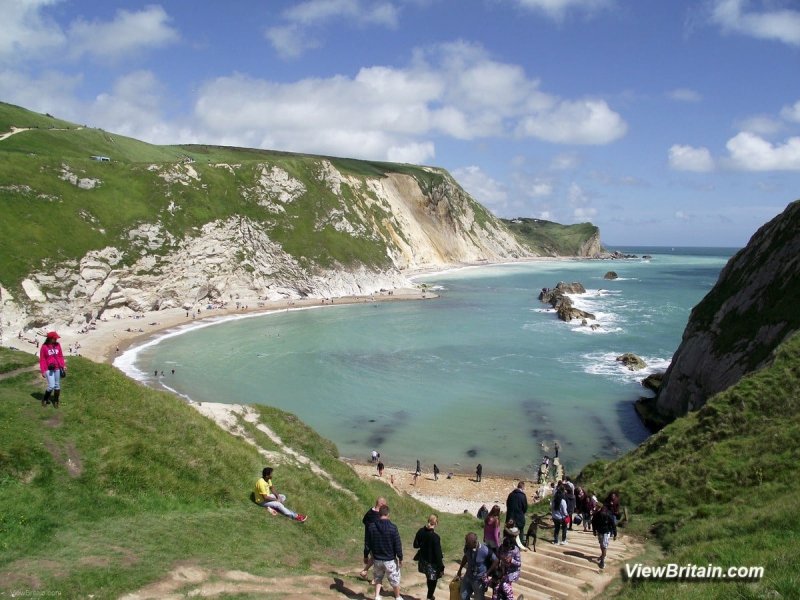 path-down-to-beach-east-of-Durdle-door-limestone-arch-Lulworth-Dorset-England