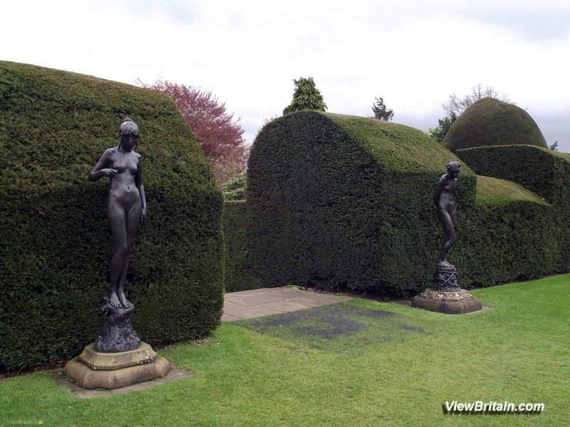 Two-Female-Statues-by-Antonio-Luchessi-at-Chirk-Castle-Wales
