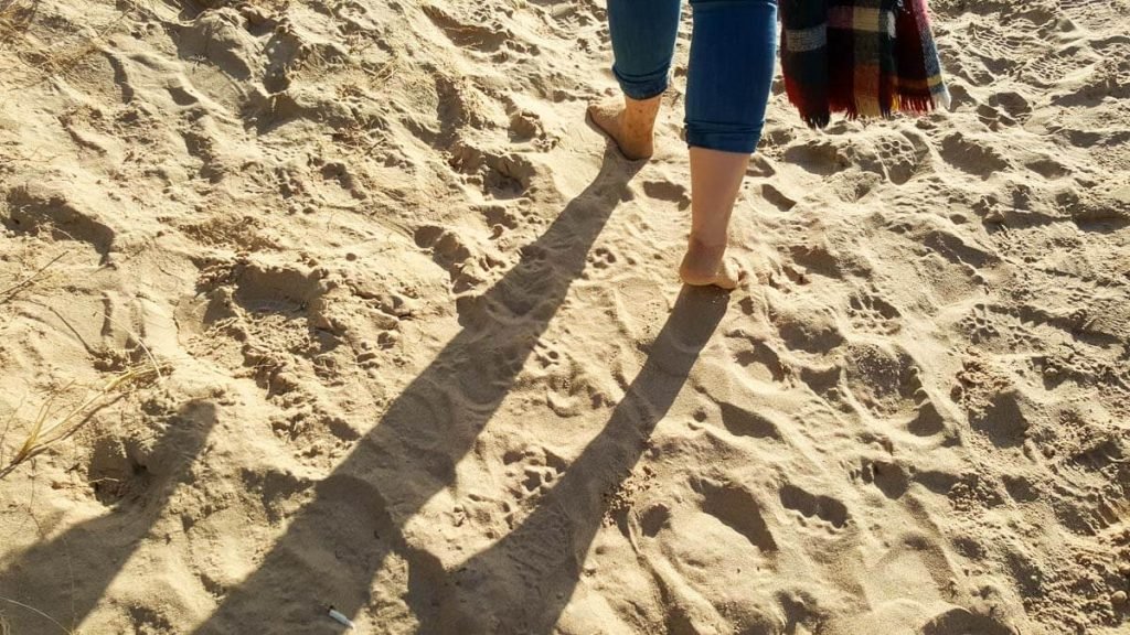 Wells-next-the-sea-beach-feet-in-sand